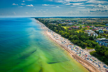 Beach with people on Baltic Sea, aerial view