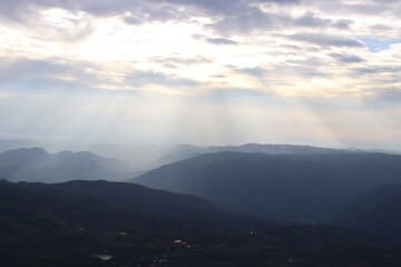 layers of mountains with fog