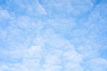 Blue sky against tiny cloud sky background.