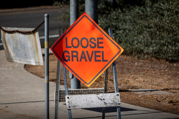 A traffic sign stating  loose gravel