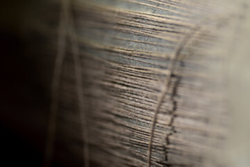 hand-sewn spine of an old book or file
