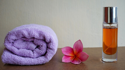spa setting with towel and orchid