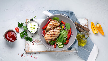 Grilled chicken fillet and vegetable salad