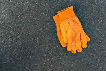 Pair of orange work gloves