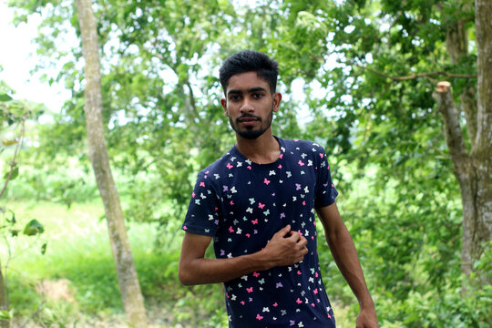 the teenager costs on a footpath in the wood