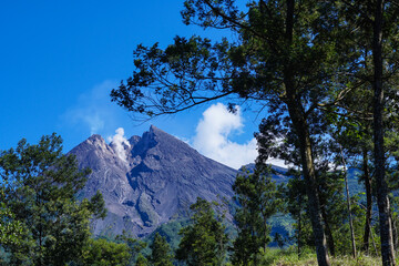 Smoky view of the crater of mount merapi after lava fall