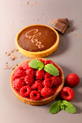 raspberry tart and chocolate cake
