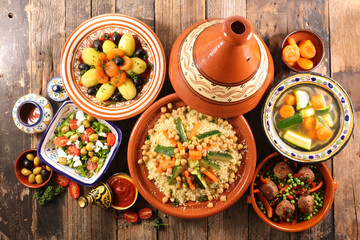 assorted of moroccan cuisine, couscous, tajine and salad