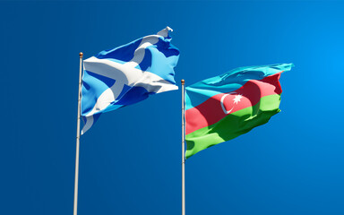 Beautiful national state flags of Scotland and Azerbaijan together at the sky background. 3D artwork concept.