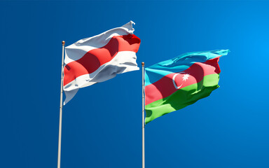 Beautiful national state flags of New Belarus and Azerbaijan together at the sky background. 3D artwork concept.