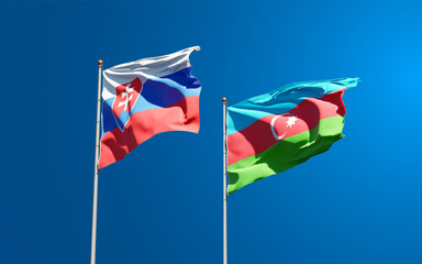 Beautiful national state flags of Slovakia and Azerbaijan together at the sky background. 3D artwork concept.