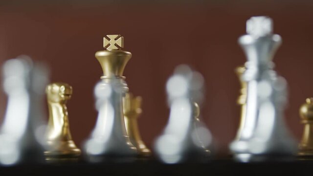 dolly shot of close up chess board game business strategy ideas concept with blur bokeh background