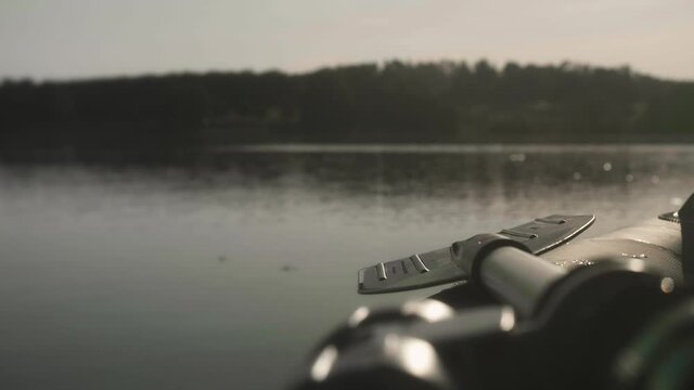 Boat floating on lake suring sunset, Slow Motion