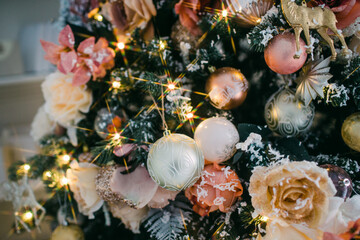 Christmas tree with Christmas toys, lights and garlands