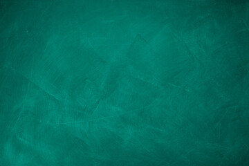 Abstract texture of chalk rubbed out on green blackboard or chalkboard background. School education, dark wall backdrop or learning concept.