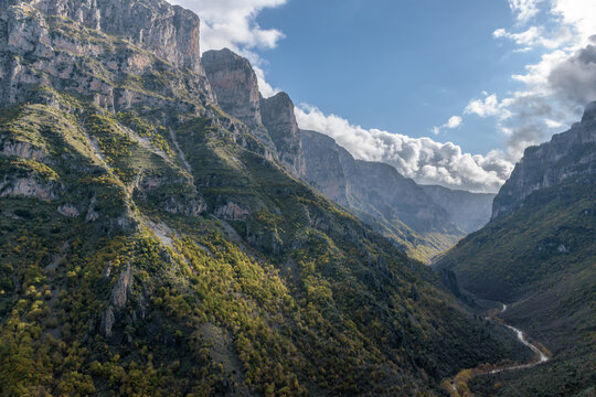 view of  Vikos Gorge, the deepest gorge in Europe, with fall colors near vikos village in Zagori Epirus, Greece.