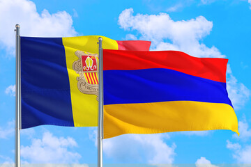 Armenia and Andorra national flag waving in the windy deep blue sky. Diplomacy and international relations concept.