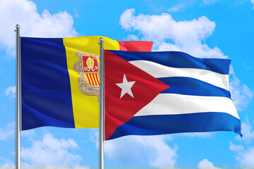 Cuba and Andorra national flag waving in the windy deep blue sky. Diplomacy and international relations concept.