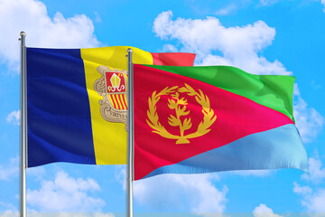 Eritrea and Andorra national flag waving in the windy deep blue sky. Diplomacy and international relations concept.