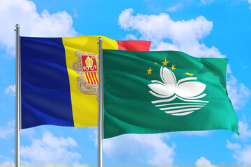 Macao and Andorra national flag waving in the windy deep blue sky. Diplomacy and international relations concept.