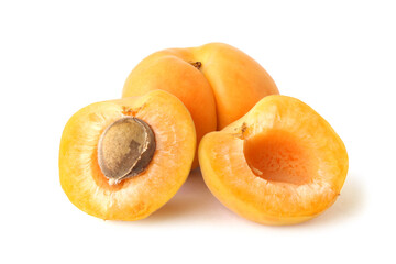 Apricot with two halves isolated on white