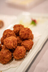 Deep fried pork meatballs, traditional Beijing cuisine in China.