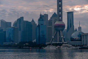 Sunrise view of Lujiazui, the financial district in Shanghai, China, on a cloudy day.