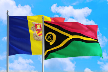 Vanuatu and Andorra national flag waving in the windy deep blue sky. Diplomacy and international relations concept.