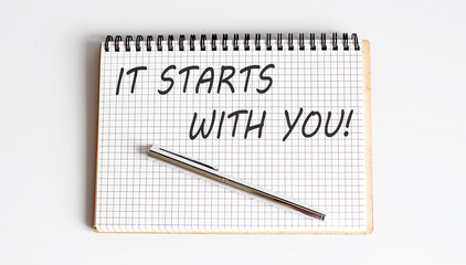 Notebook with pen and Notes about It Starts With You