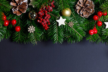 Christmas tree with decor on black