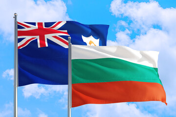 Bulgaria and Anguilla national flag waving in the windy deep blue sky. Diplomacy and international relations concept.