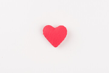 Beautiful red hearts on white paper background
