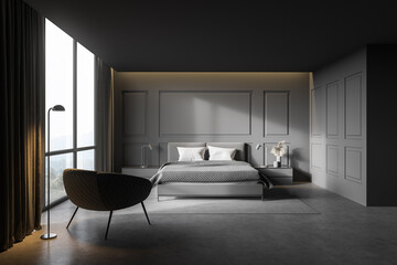 Gray master bedroom interior with armchair