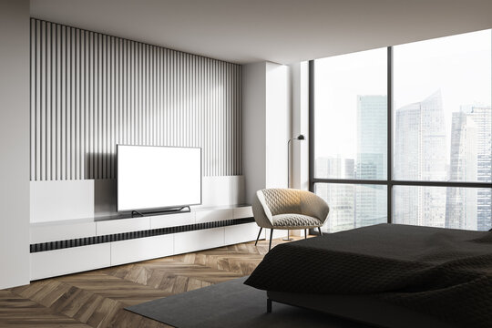 White master bedroom corner with mock up TV screen