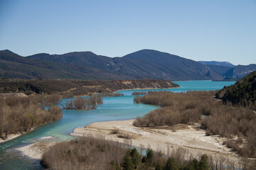 Landscape of a lake between mountains.