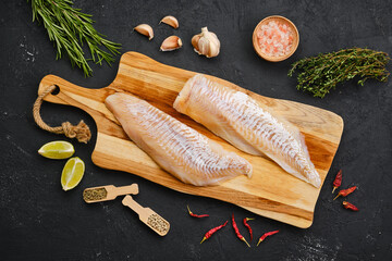 Top view of haddock fillet with seasoning