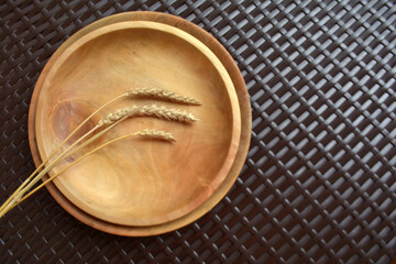 Modern minimalistic wooden dishes or plates. Kitchen decor and cozy home. Eco-friendly tableware and zero plastic concept