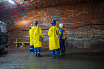 Miners in salt potash mine underground tunnel amazing multicolored