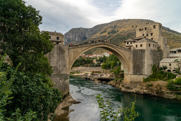 Fototapeta na wymiar Old town of Mostar, Bosnia and Herzegovina, with Stari Most bridge, Neretva river and old mosques