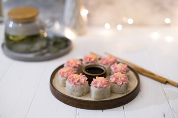 Sushi roll with pink cream, salmon