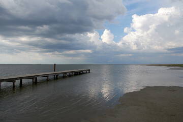 Fototapeta na wymiar wooden pier overlooking the sea