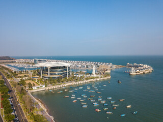 Fototapeta na wymiar Aerial view of the Yacht Terminal, Xiamen Xiangshan Yacht Club in Xiamen city. Xiamen city architecture on the coastline in Fujian, China