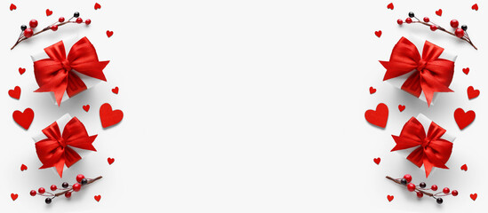 Gift boxes with red ribbon and hearts on white background, flat lay, copy space