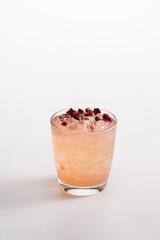 Summer refreshing cocktail with ice. Sparkling water, rum, rhubarb puree, apple syrup, lemon juice.