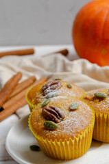 Homemade Pumpkin Muffins with Pecan nuts. thanksgiving.
