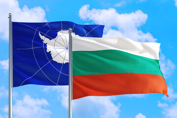 Bulgaria and Antarctica national flag waving in the windy deep blue sky. Diplomacy and international relations concept.