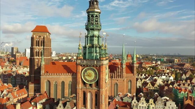 Beautiful clock of the town hall in Gdansk at sunrise, Poland