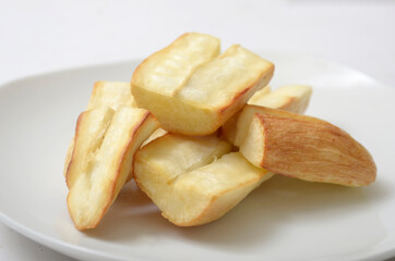 Fried Cassava on a white plate