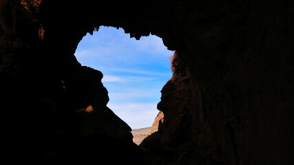 View of natural rock bridge Imi-n-Ifri near village Demnate, Morocco on the foothills of High Atlas Mountains looking similar to the silhouette of the African continent.