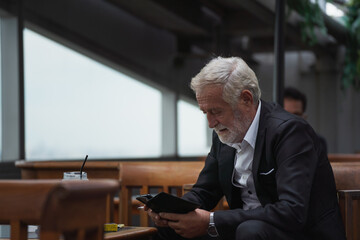 Financial crisis concept. Man senior concern, The virus crisis resulted in the economic downturn, and businesses were affected. People lost jobs All over the world are affected by the virus.